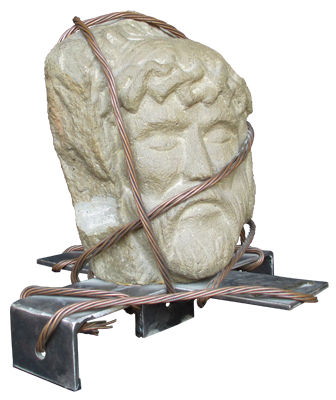 christ head tied with a cable on a cross